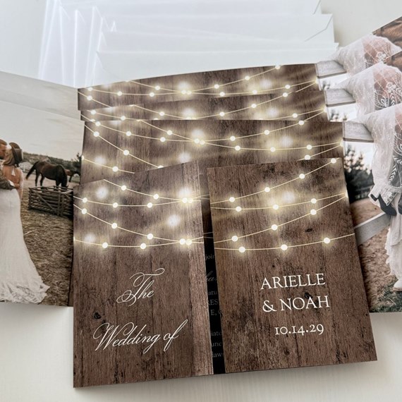 wedding invitation with photo area and string lights
